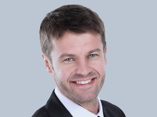 Closeup portrait of a confident handsome business man