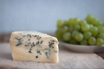 cheese on a board..and grapes