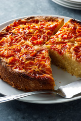 Close Up of Blood Orange Almond Citrus Cake with Slices Cut on Plate