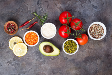 Organic Healthy food Clean eating selection Including Certain Protein Prevents Cancer on a dark stone backgound