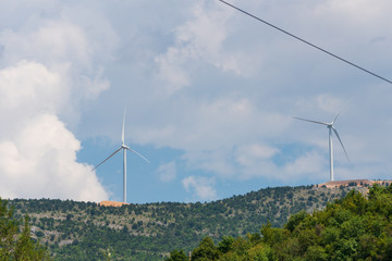 wind farms on mountain peaks