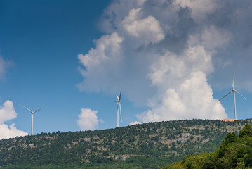 wind farms on mountain peaks