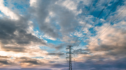 Clouds and powerlines.