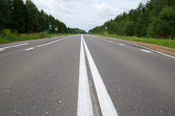 Asphalt road with double solid line