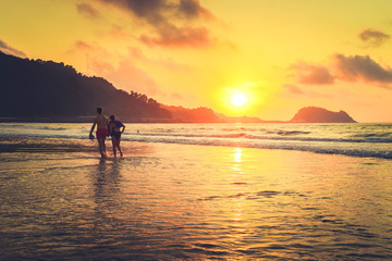 Orange sunset over Zarauz city beach, Pais Vasco, Spain, retro toned