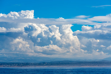 Beautiful Winter Sky Full of Puffy White Clouds Over Monterey Bay, California