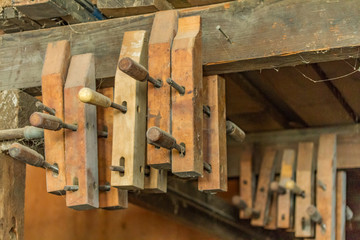 Vintage Woodworkers Wood Clamps in an Artisan Shop