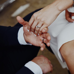Hands of a wedding couple