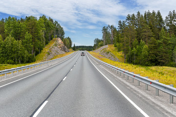 Fototapeta na wymiar Highway beyond the horizon. Russia, Karelia