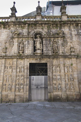 Fototapeta na wymiar Santiago de Compostela, Galicia, Spain, June 14, 2018: Detail of the richly decorated façade of the Cathedral of St. James in Santiago de Compostela