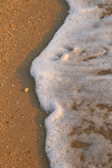 water foam on sand