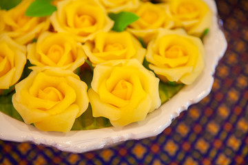 Yellow Rose Allure or Alua, modern approach Thai style dessert made from flour. Concept style for Food Styling, creative plating, decorating presentation idea, arrangement for party, catering, banquet