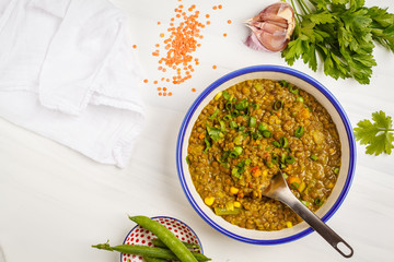 Lentil curry, Indian cuisine, tarka dal, white background, top view. Vegan food. - obrazy, fototapety, plakaty