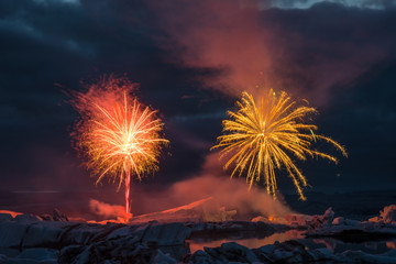 Fireworks show Jokulsarlon Glacier ice lagoon in south Iceland