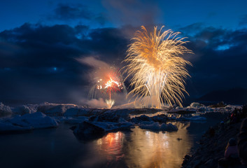 Fireworks show Jokulsarlon Glacier ice lagoon in south Iceland
