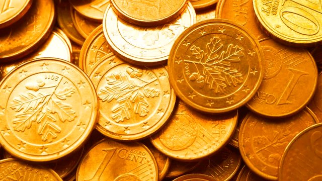 The video is a cent euro coin. The background of money.