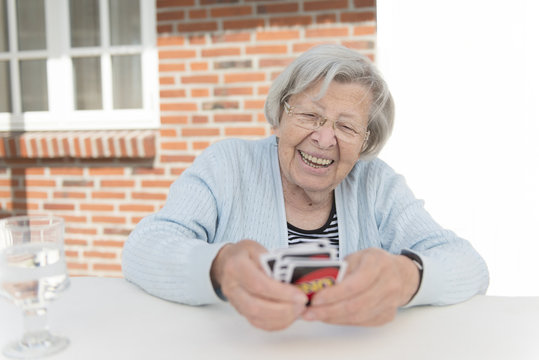 Senior Woman Playing Cards 1