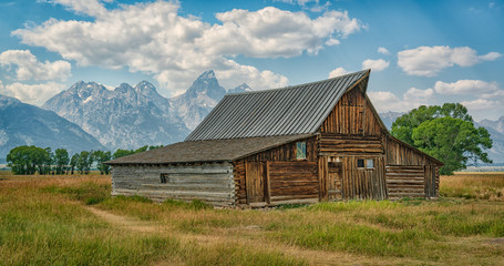 old barn with the Tetons in the background