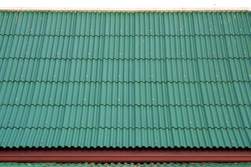 green corrugated metal roof. background