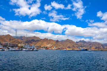 Fototapeta premium The view of the marina and the Anaga mountains. Santa Cruz in the harbor.