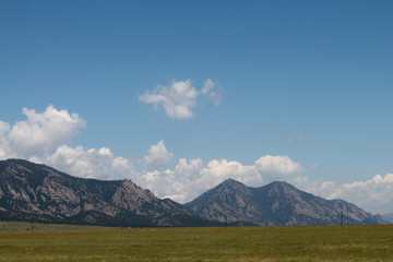 Mountains in the background with blue skies of plains