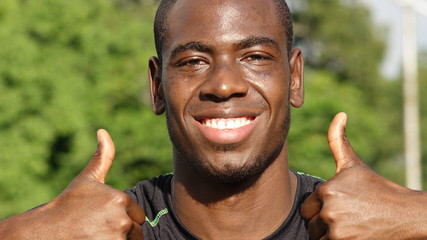 Black Male Athlete With Thumbs Up