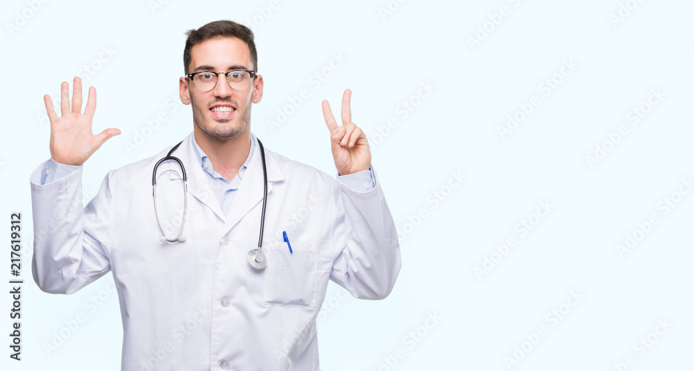 Poster handsome young doctor man showing and pointing up with fingers number seven while smiling confident 