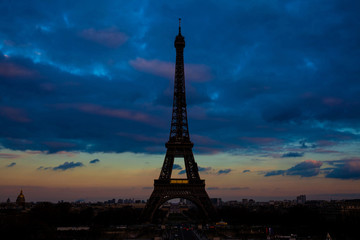 Tour Eiffel the most  famous Parisian icon at sunsent seen from Trocadero in a freezing winter day just before spring