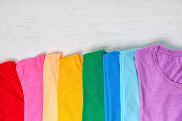 Colorful collection of  t-shirts on light background