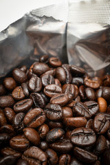 roasted coffee beans on wood background