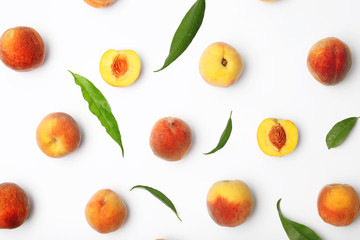 Fototapeta na wymiar Composition with fresh sweet peaches on white background
