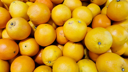 Tangerines and orange isolated on white background