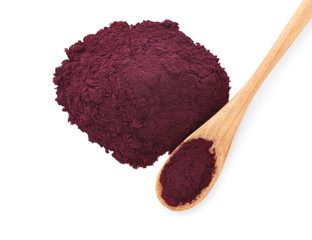 Wooden spoon and acai powder on white background, top view