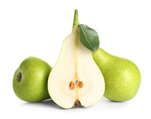 Whole and sliced pears on white background