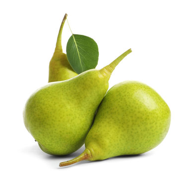 Whole ripe pears on white background