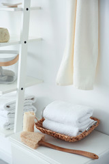 Fototapeta na wymiar Clean towels and sponges on table indoors