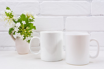 Two white coffee mug mockup with viburnum flowers