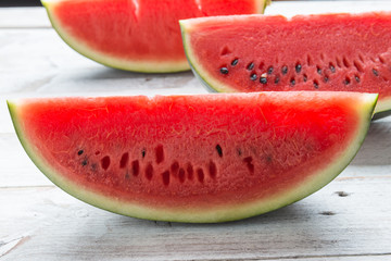 Watermelon on wooden table background