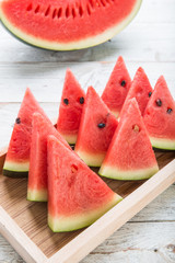 Watermelon on wooden table background