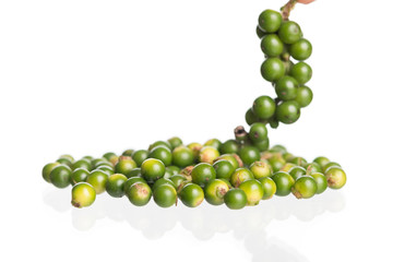 Fresh black pepper on white background