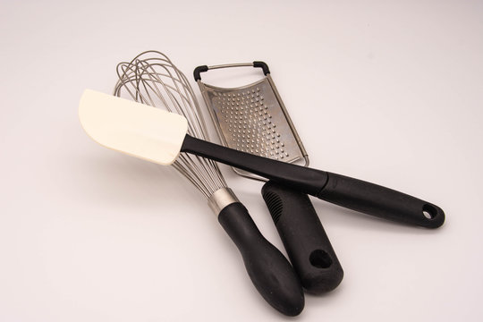 various kitchen utensils for mixing