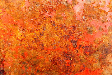 Rusted beige painted metal wall.