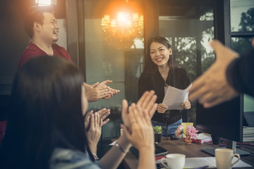 asian freelance team meeting with happiness in modern home office