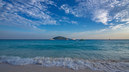 Fototapeta premium Turquoise Sea Island Blue Sky Background