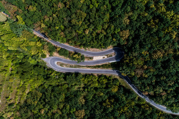 Winding road serpentine from a high mountain pass in the mosel village Brodenbach Germany Aerial view