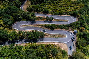 Winding road serpentine from a high mountain pass in the mosel village Brodenbach Germany Aerial view