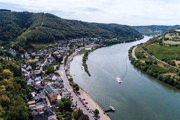 Fototapeta na wymiar Aerial view of the mosel village Brodenbach in Germany on a sunny summer day
