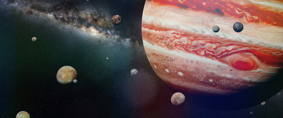 Fototapeta premium planeta Jowisz z niektórymi z 69 znanych księżyców z galaktyką Drogi Mlecznej