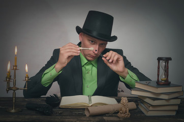 Detective agent collecting a compromising evidence and searching for fingerprint. Key to...