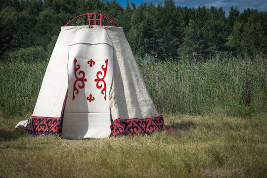 Kazakh small yurt near lake reeds